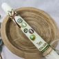 Preview: Kommunionkerze Baum in Olive-Braun mit christlichen Symbolen
