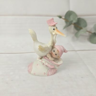 Figur Storch mit Baby Mädchen