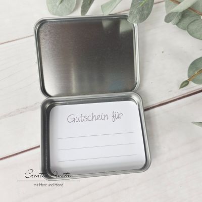 Gutscheinverpackung zu Weihnachten mit Schneeflocken