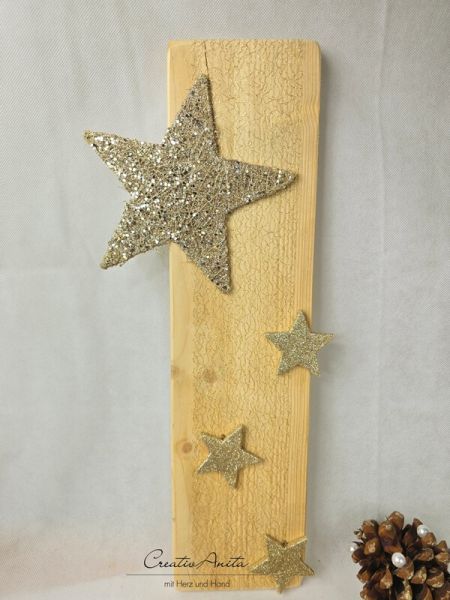 Holzbrett dekoriert mit Sterne