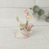 Figur Storch mit Baby Mädchen